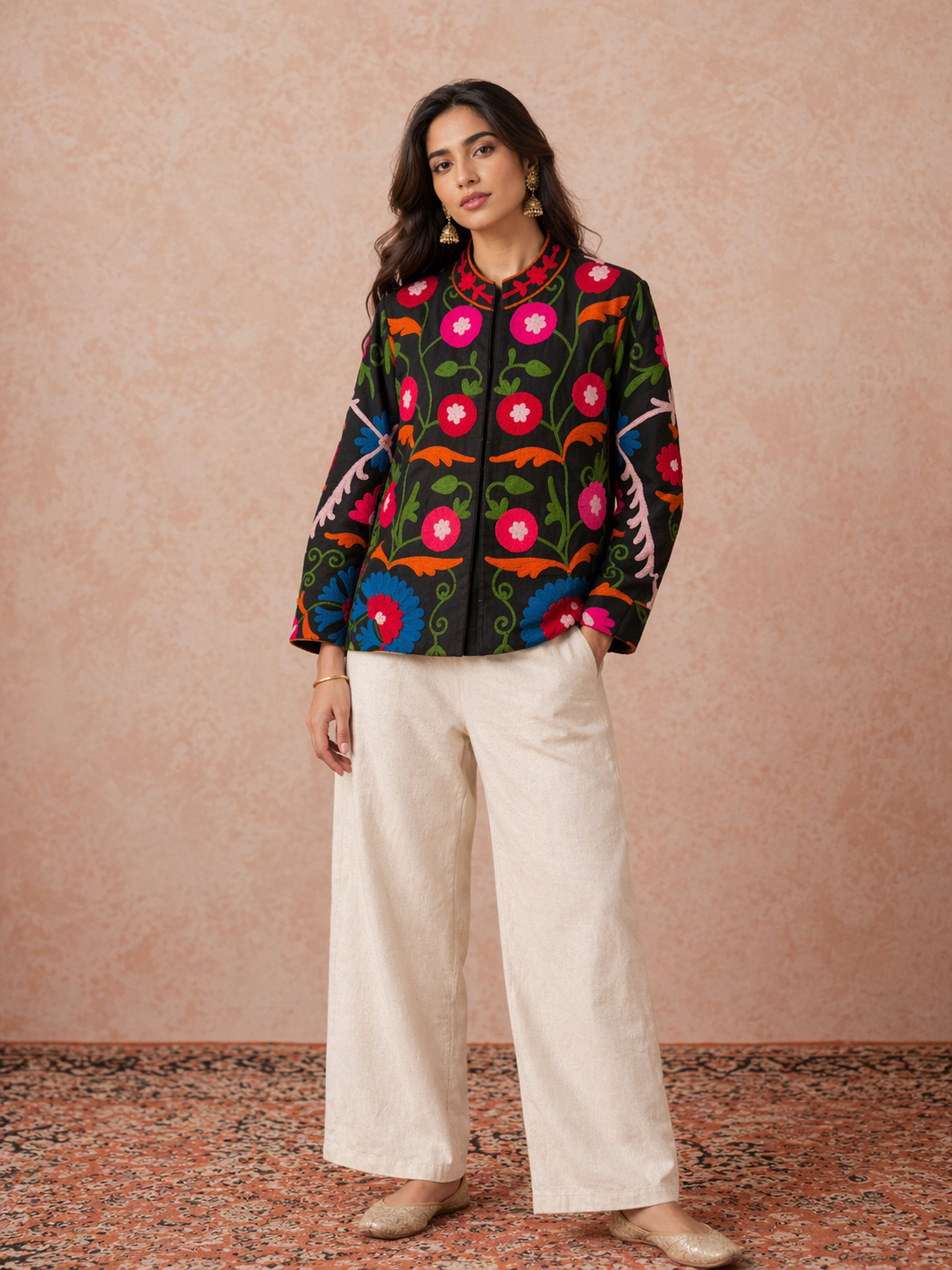 Black and gold floral hand-embroidered vest by Gul