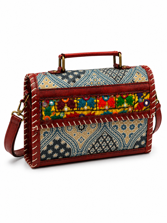 Black Banjara trunk bag with brass bells — front and side view
