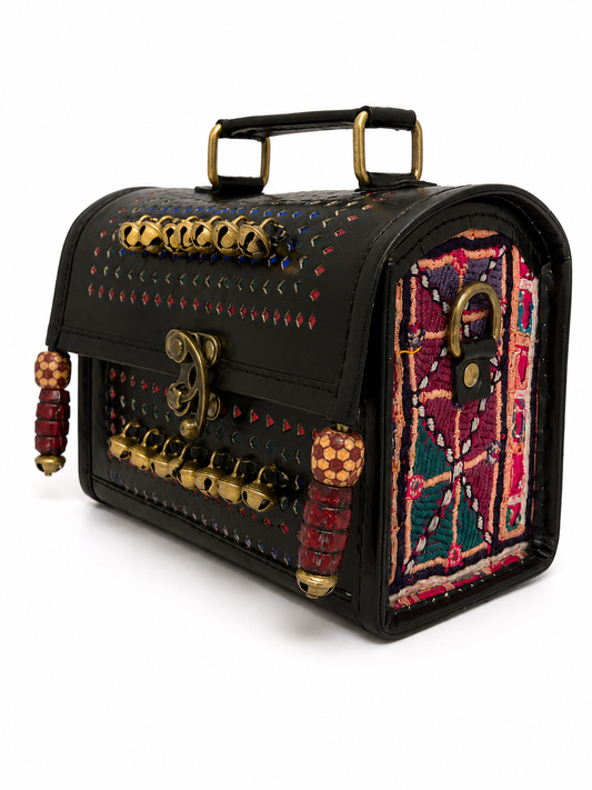 Brown leather cowrie shell trunk bag — interior detail